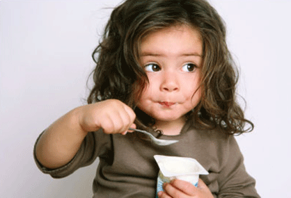 Little-girl-eating-yogurt.gif
