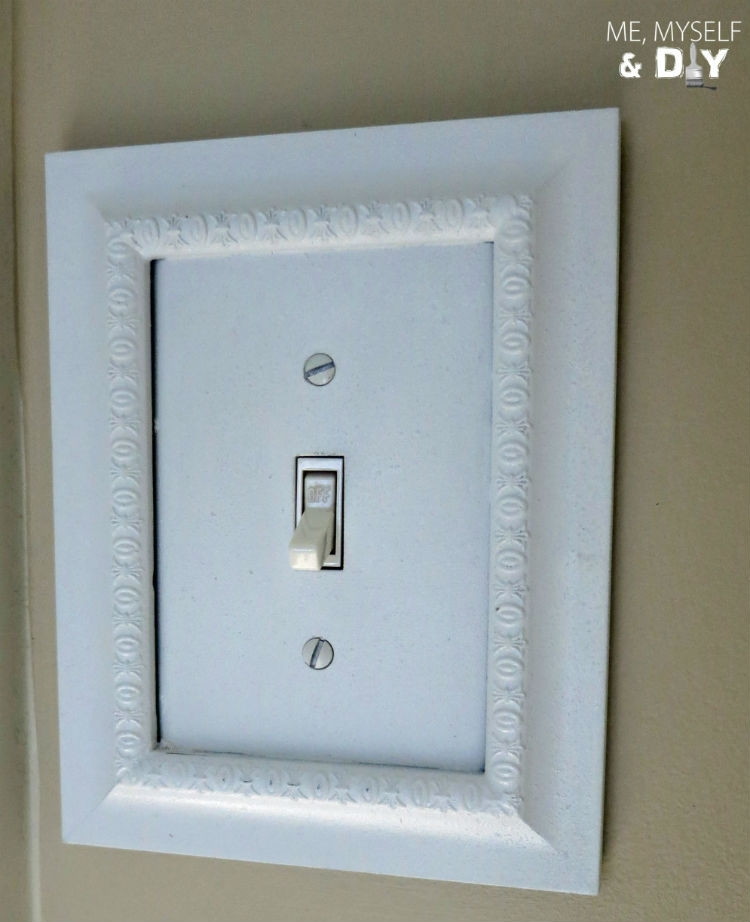 Frame switch plate covers with Dollar Tree picture frames.