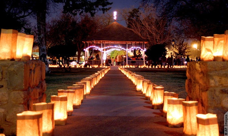 Create romantic lighting with paper-bag lanterns.