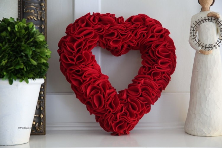 Use felt, a foam wreath and pins to make this rose wreath