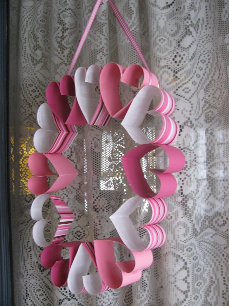Create a heart wreath with festive paper and tape