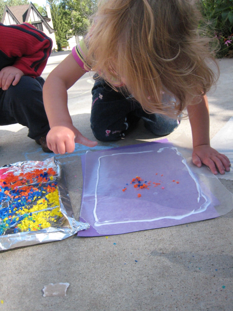 Let your kids create "stained glass" with crayons and wax paper.